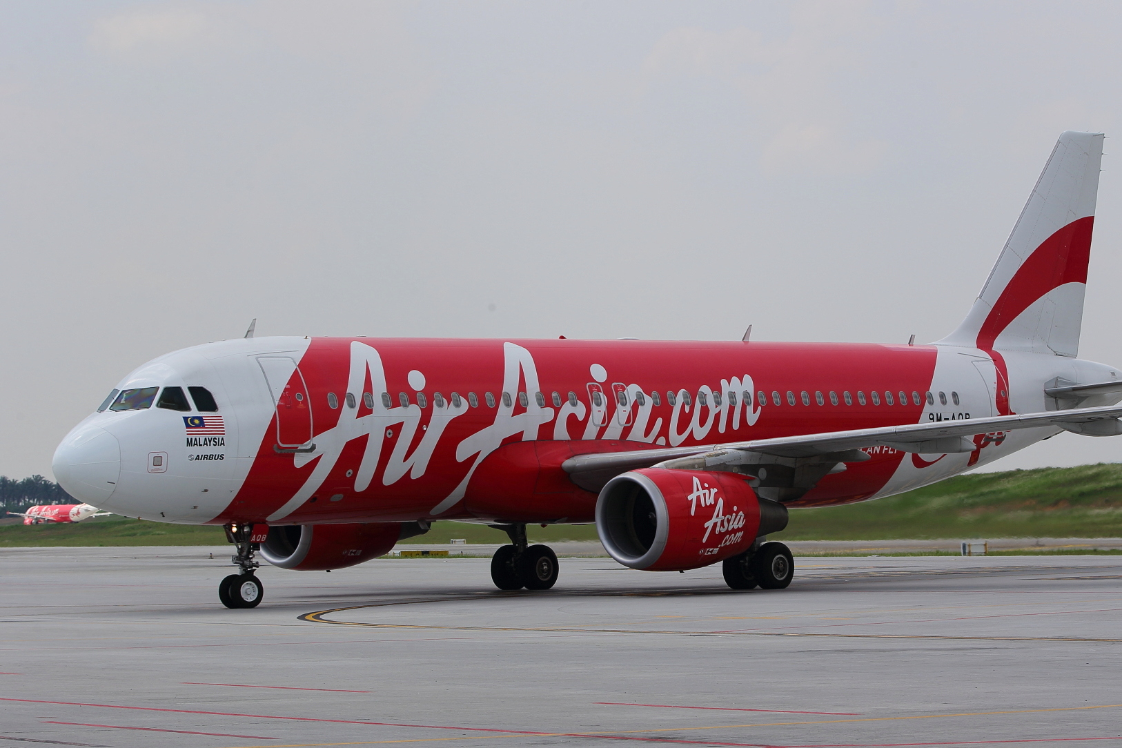 AirAsia Malaysia A320 at klia2. Picture by Steven Howard of TravelNewsAsia.com Click to enlarge.