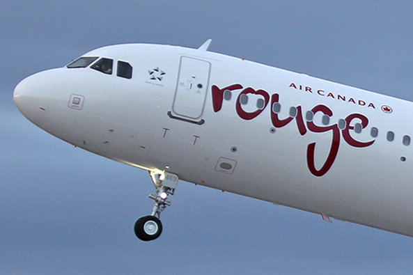 Air Canada Rouge Airbus A321 reg: C-FJOU. Click to enlarge.