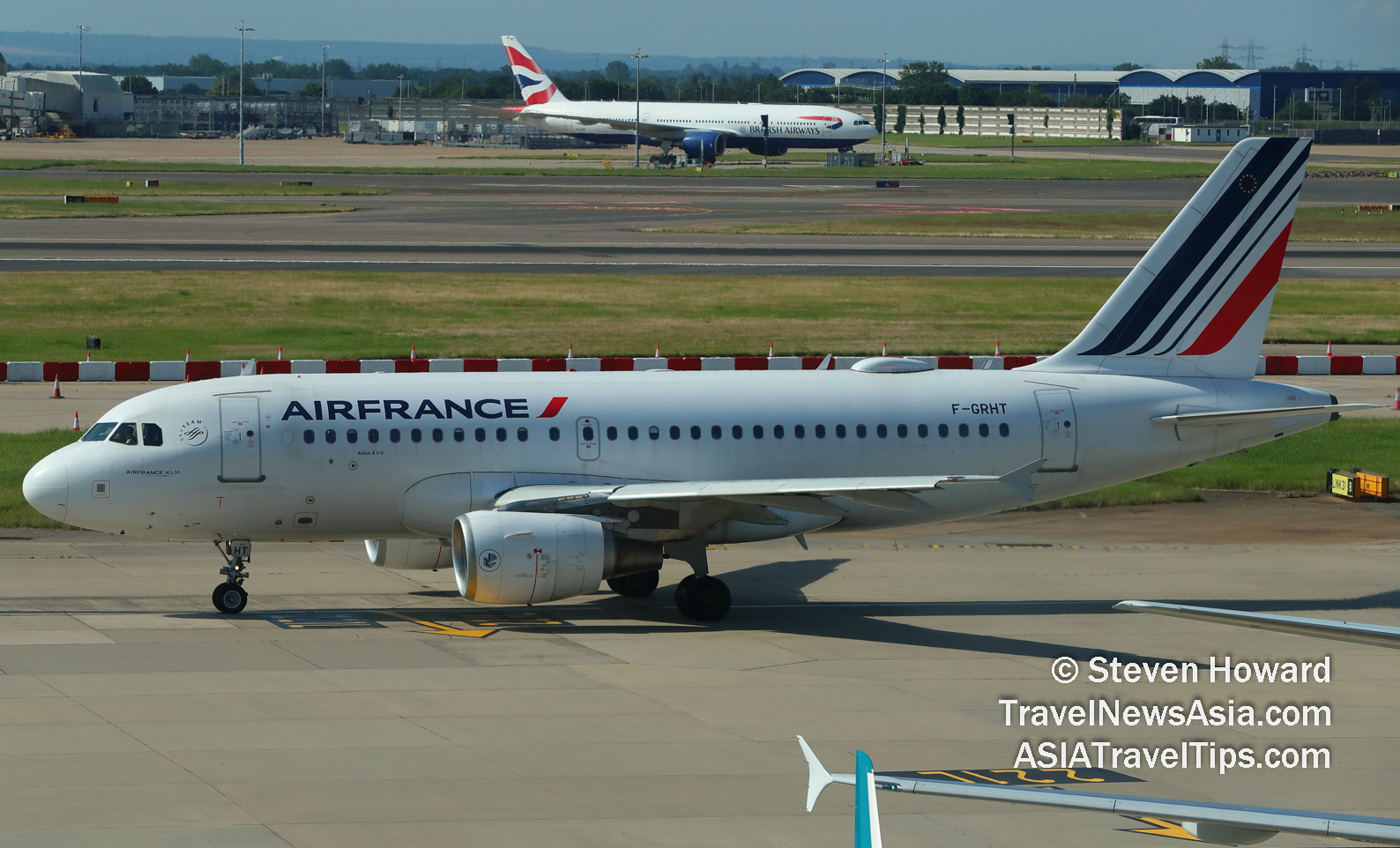 Air France Airbus A319 reg: F-GRHT. Picture by Steven Howard of TravelNewsAsia.com Click to enlarge.