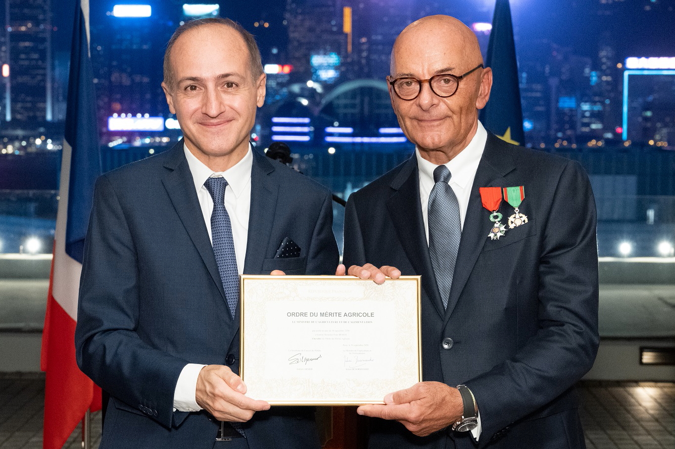 Alexandre Giorgini, Consul General of France to Hong Kong and Macau, with Peter Borer (right), Chief Operating Officer of The Hongkong and Shanghai Hotels (HSH). The French Government bestowed the distinction of Chevalier dans l’Ordre National de la Légion d’Honneur and Chevalier dans l'Ordre du Mérite Agricole on Mr Borer Wednesday. Click to enlarge.