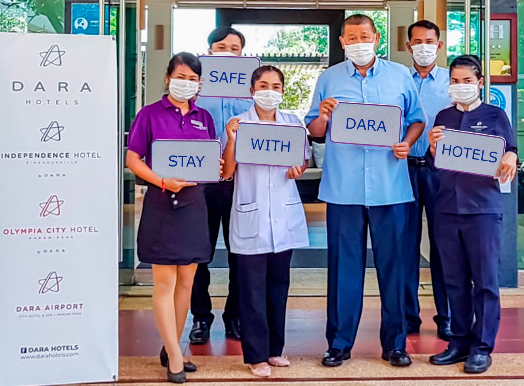 Employees of the Dara Independence Hotel promote 'Stay Safe with Dara Hotels' programme. Click to enlarge.