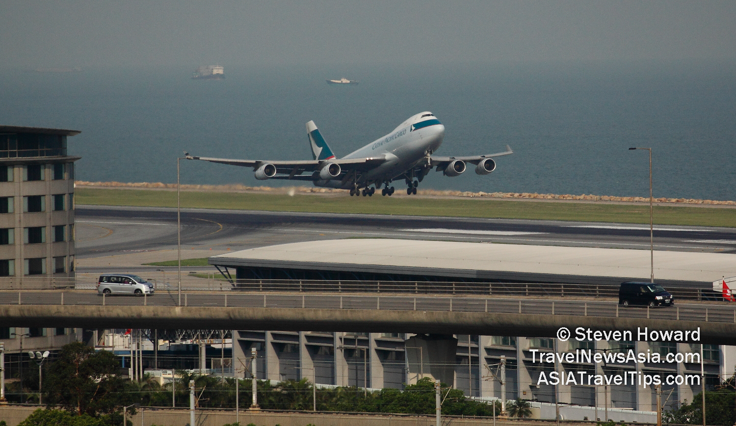 Old picture of a Cathay Pacific Boeing 747F reg: B-HUQ taking off from HKIA. Picture by Steven Howard of TravelNewsAsia.com Click to enlarge.