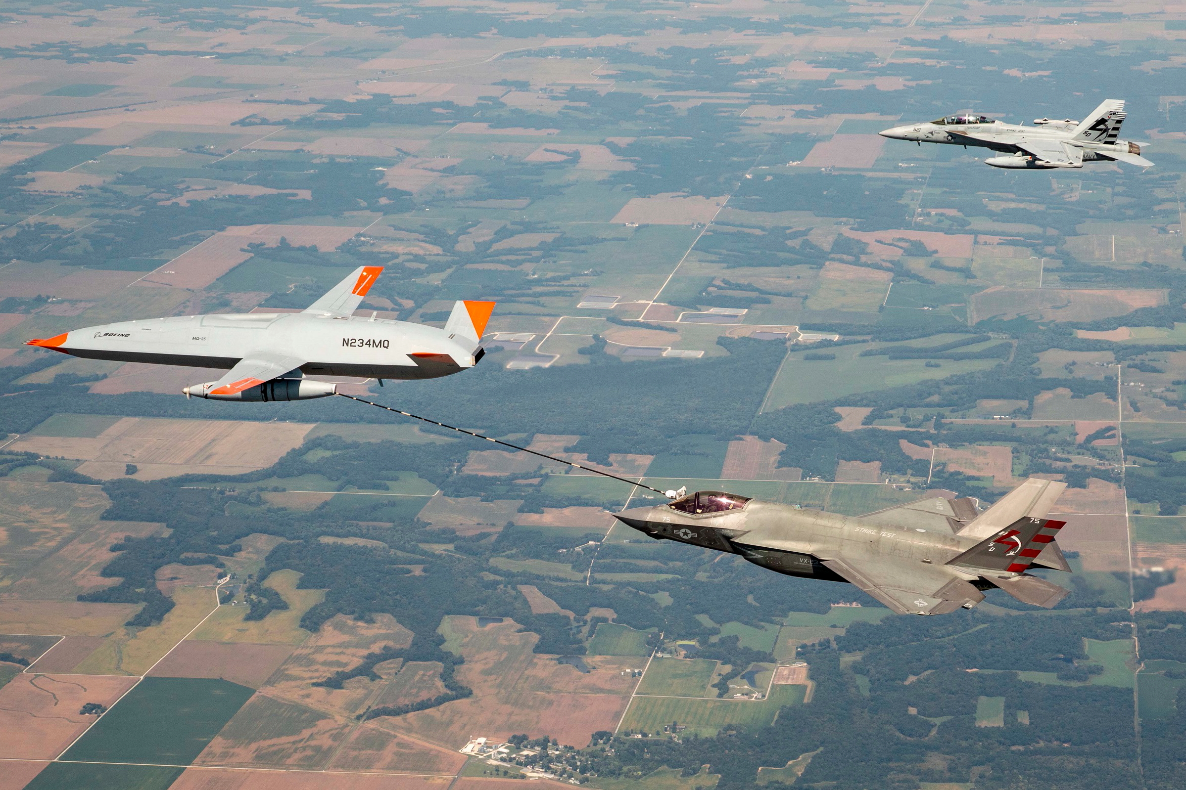 For two years, Boeing and the Navy have been flight testing the Boeing-owned MQ-25 test asset from MidAmerica Airport, where in recent history-making missions T1 has refueled an F/A-18 Super Hornet, an E-2D Hawkeye and an F-35C Lightning II. Click to enlarge.