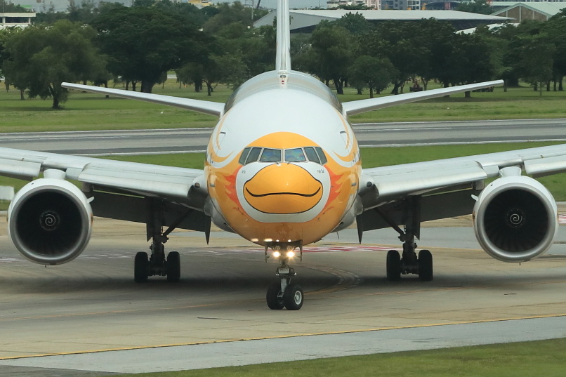 Smiling Nok Scoot aircraft at DMK. Picture by Steven Howard of TravelNewsAsia.com Click to enlarge.