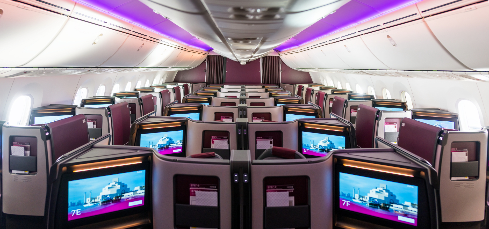Qatar Airways' new Adient Ascent Business Class Suite is arranged in a herringbone pattern with a 1-2-1 configuration, each suite has direct aisle access with a sliding door. Passengers seated in adjoining centre suites can slide the privacy panels away at the touch of a button to create their very own space. Click to enlarge.