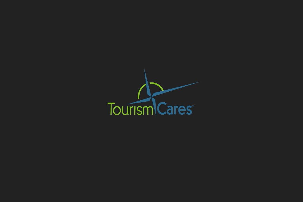Logo of Tourism Cares, a non-profit which describes its mission as 'uniting the travel industry to help people and places thrive'. Click to enlarge.