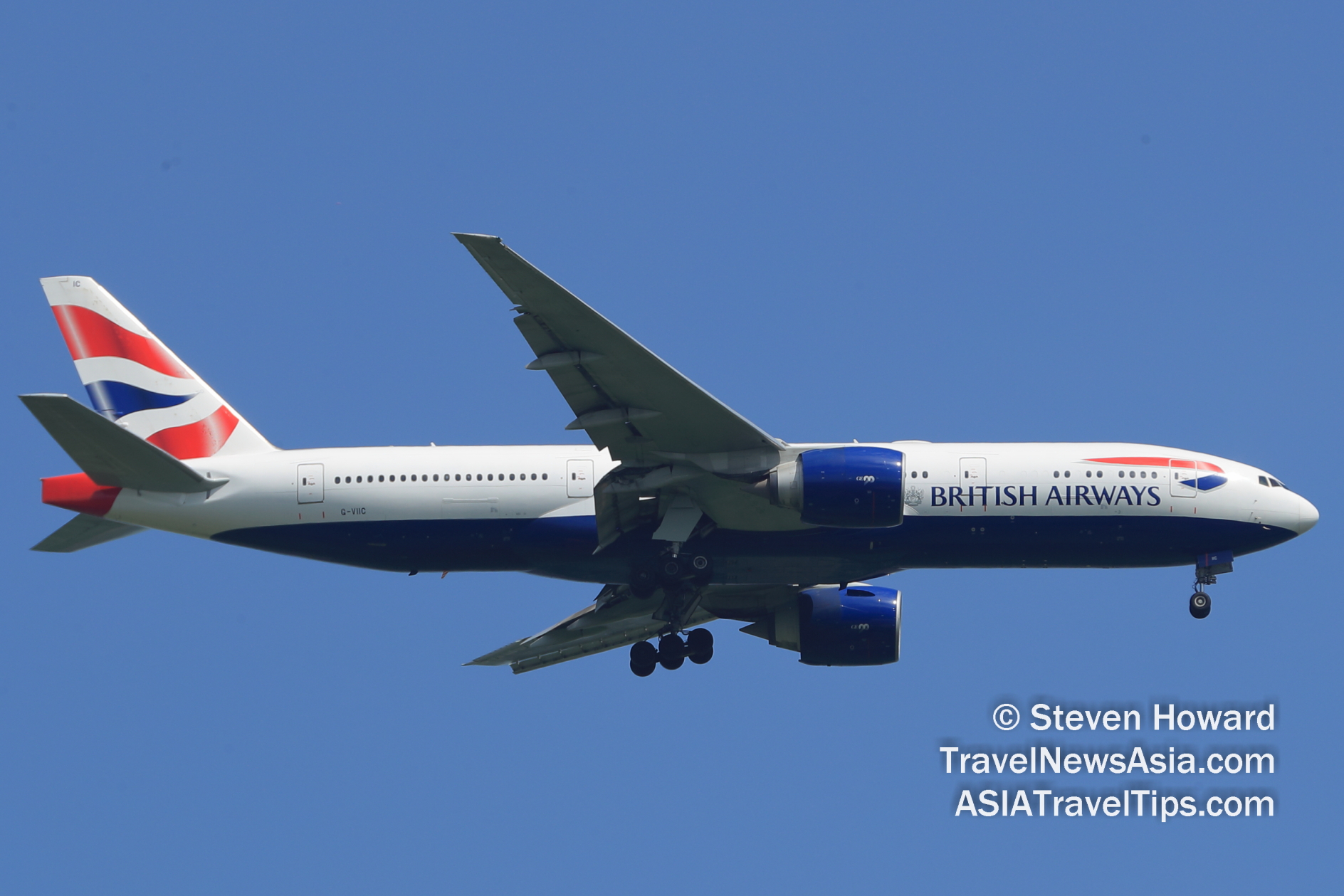 British Airways Boeing 777 reg: G-VIIC. Picture by Steven Howard of TravelNewsAsia.com Click to enlarge.