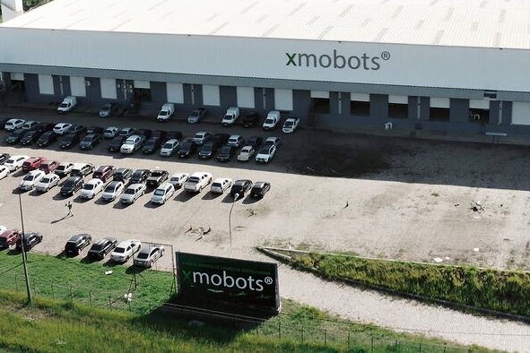 Embraer is buying a minority stake in XMobots. Click to enlarge.