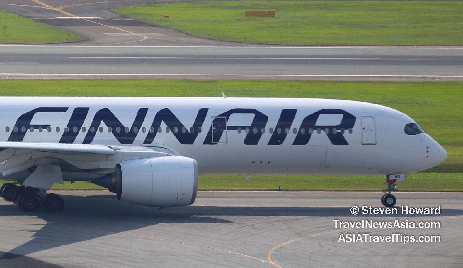 Finnair A350-900 reg: OH-LWD. Picture by Steven Howard of TravelNewsAsia.com Click to enlarge.