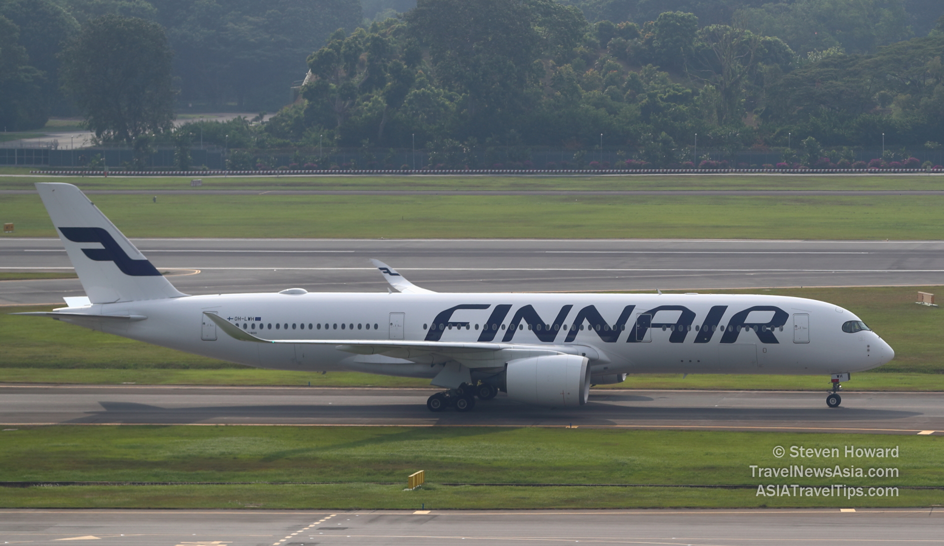 Finnair A350-900 reg: OH-LWH. Picture by Steven Howard of TravelNewsAsia.com Click to enlarge.