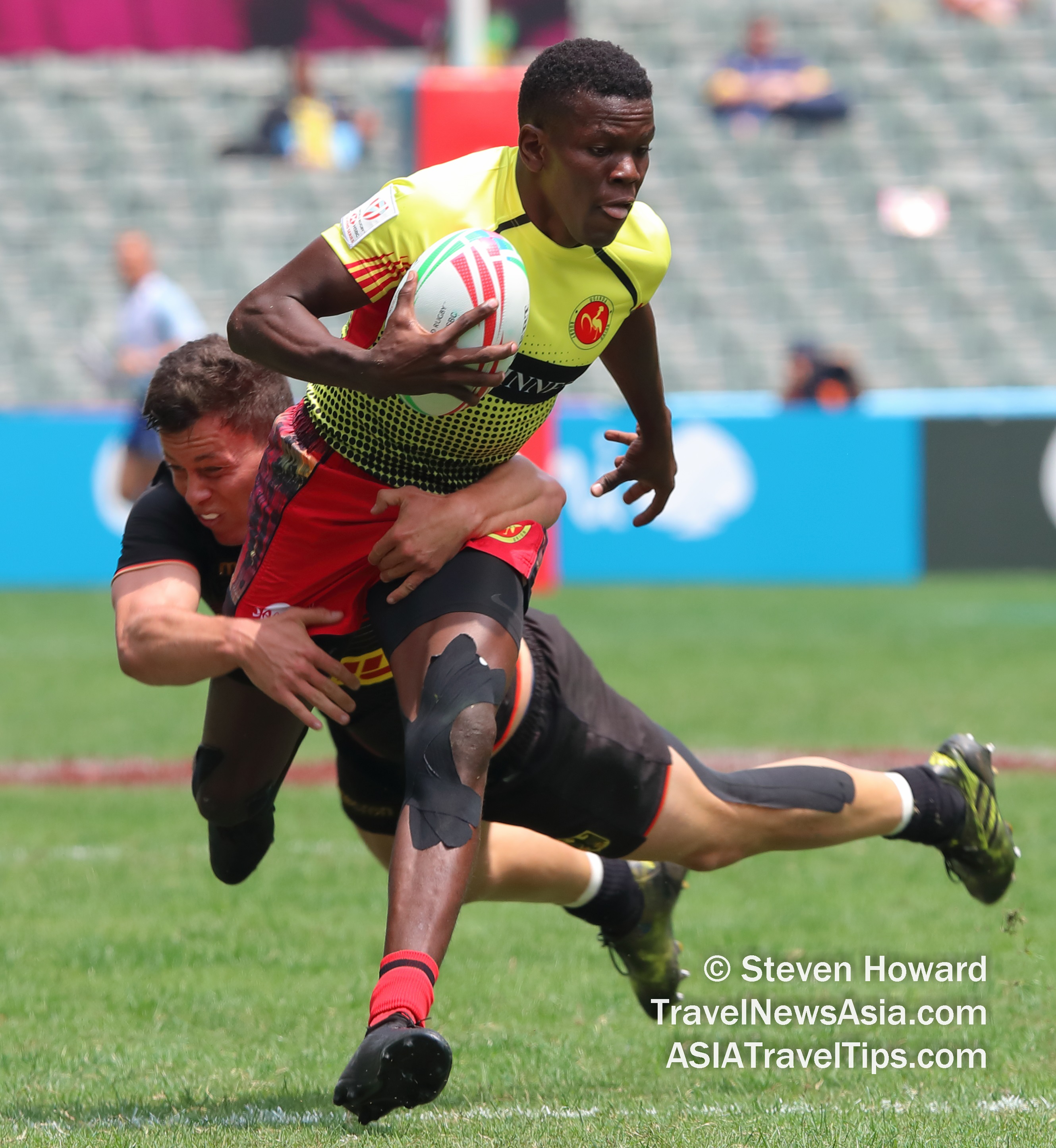 Germany 7s and Uganda 7s in action at HK7s 2019. Picture by Steven Howard of TravelNewsAsia.com Click to enlarge.