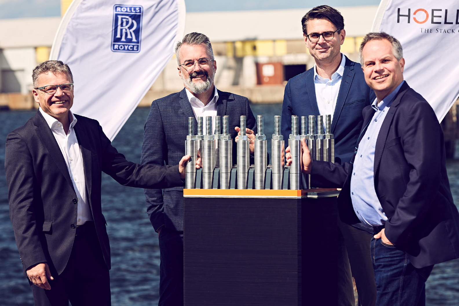 From left: Dr. Otto Preiss, COO of Rolls-Royce's Power Systems Division; Armin Fürderer - Power Systems' Head of Net Zero Solutions Business Unit; Stefan Höller - Founder and Head of Development of Hoeller; and Matthias Kramer, Joint Head - Hoeller Electrolyzer. Click to enlarge.