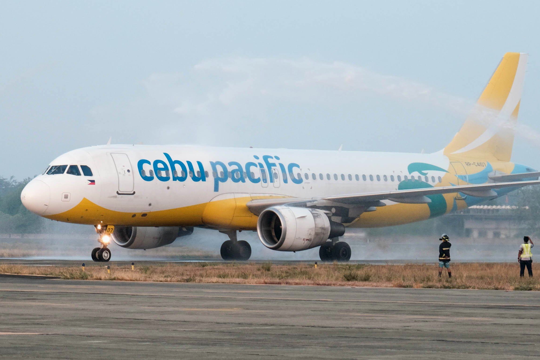 Cebu Pacific flight 5J 404 Manila-Laoag welcomed with a water cannon salute upon landing at LAO. Photo courtesy of the Provincial Government of Ilocos Norte. Click to enlarge.