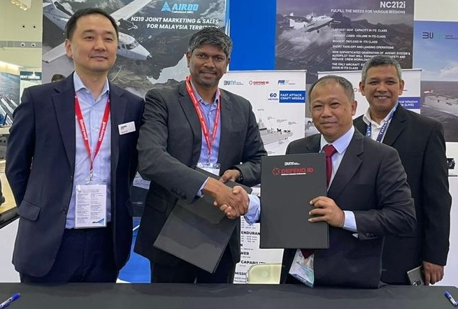 Representatives from Honeywell and PT Dirgantara Indonesia (PTDI) at LIMA 2023. Click to enlarge.