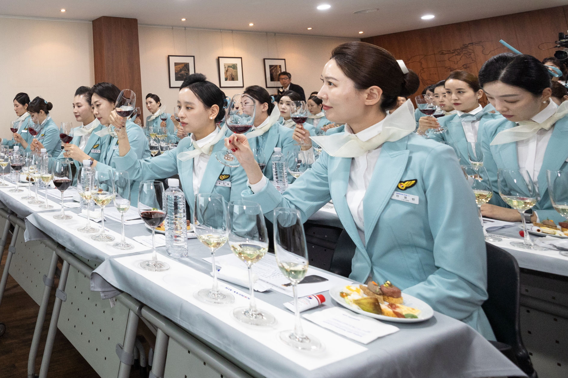Sommelier Marc Almert teaches Korean Air Cabin Crew about the new wine selection. Click to enlarge.