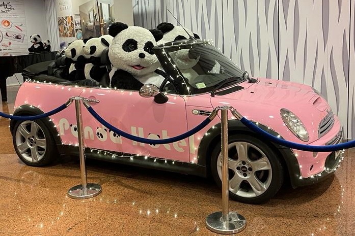 Happy family of pandas in a pink mini at the Panda Hotel in Hong Kong. Picture by Natsuda Seedama. Click to enlarge.