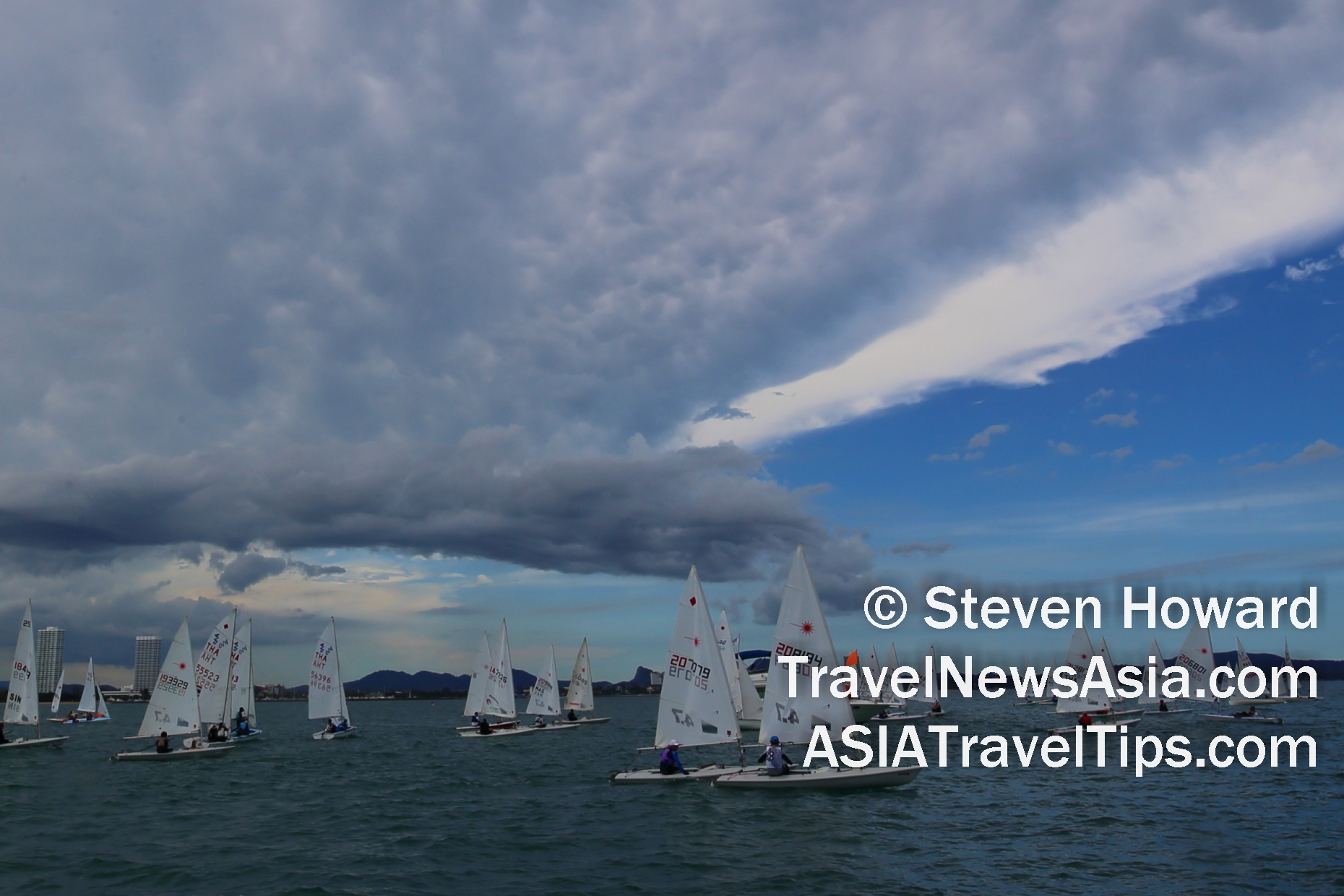 Clear skies ahead? Sailing in Pattaya. Picture by Steven Howard of TravelNewsAsia.com Click to enlarge.