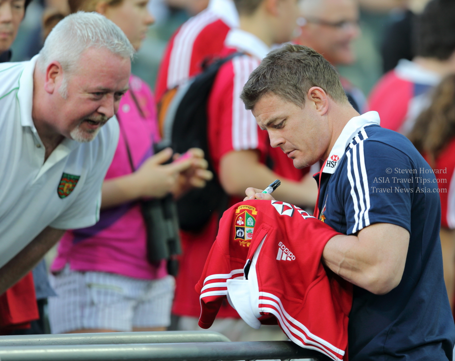 Brian O'Driscoll, an Irish Rugby and Lions Legend, signing a shirt in Hong Kong in 2013. The Lions stopped in Hong Kong on their way to Australia. Picture by Steven Howard of TravelNewsAsia.com Click to enlarge.