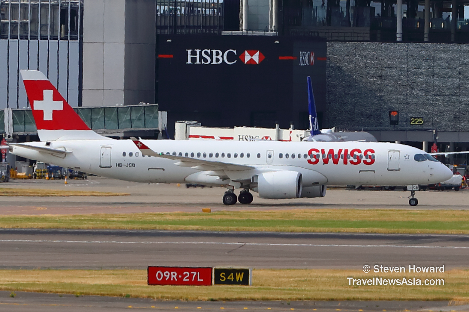 SWISS A220-300 reg: HB-JCB at LHR. Picture by Steven Howard of TravelNewsAsia.com. Click to enlarge.