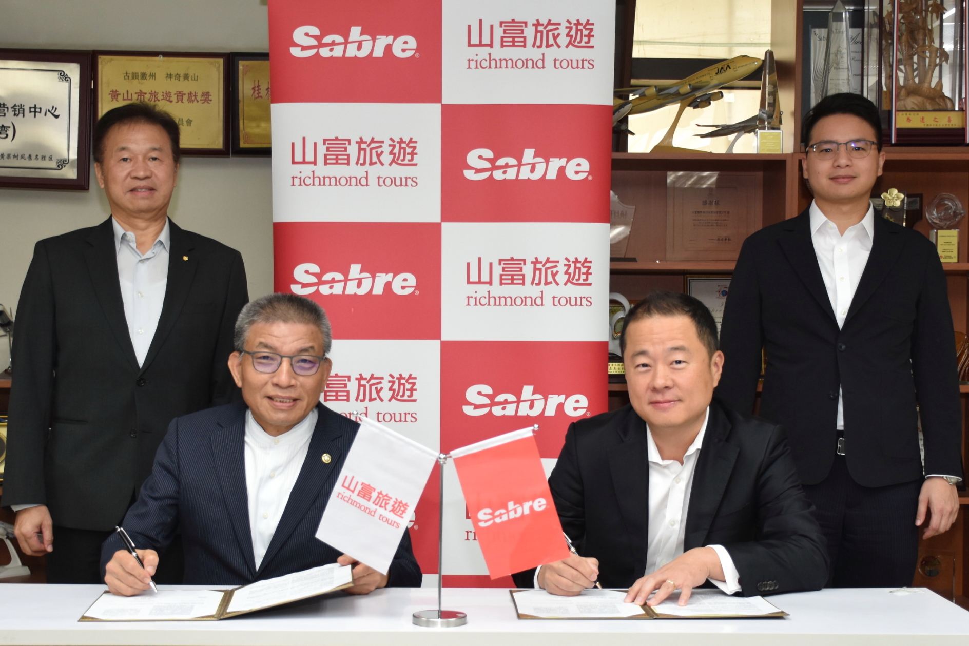 From left: Simon Lee, GM - Sabre Taiwan; Chico K.S. Chen, Chairman, Richmond Tours; Charles Lee, Regional Director, Sabre Asia Pacific; and Richi Chen, CIO, Richmond Tours.. Click to enlarge.