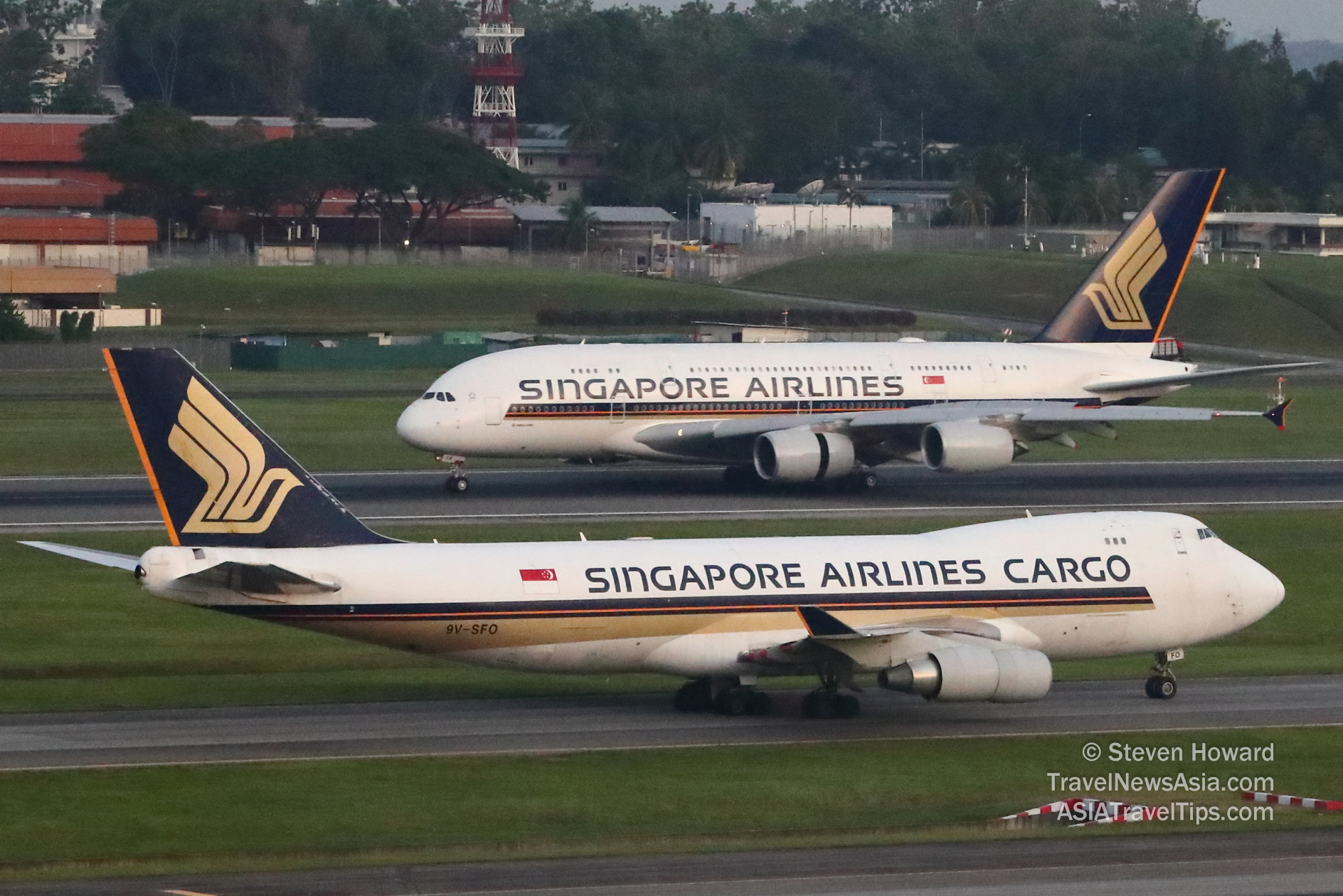 Singapore Airlines A380 and B747F at Changi Airport. Picture by Steven Howard of TravelNewsAsia.com Click to enlarge.