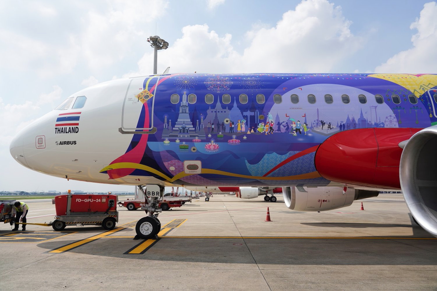 Thai AirAsia A320 with TAT's Amazing New Chapters livery. Click to enlarge.