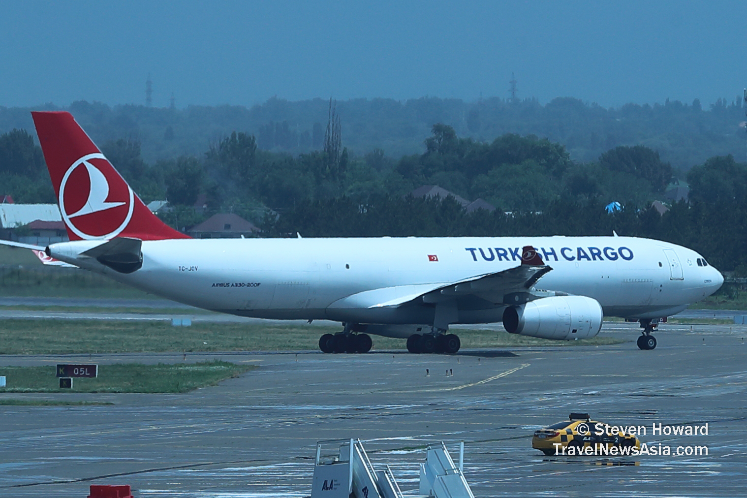 Turkish Cargo A330-200F reg: TC-JOV at ALA. Picture by Steven Howard of TravelNewsAsia.com Click to enlarge.