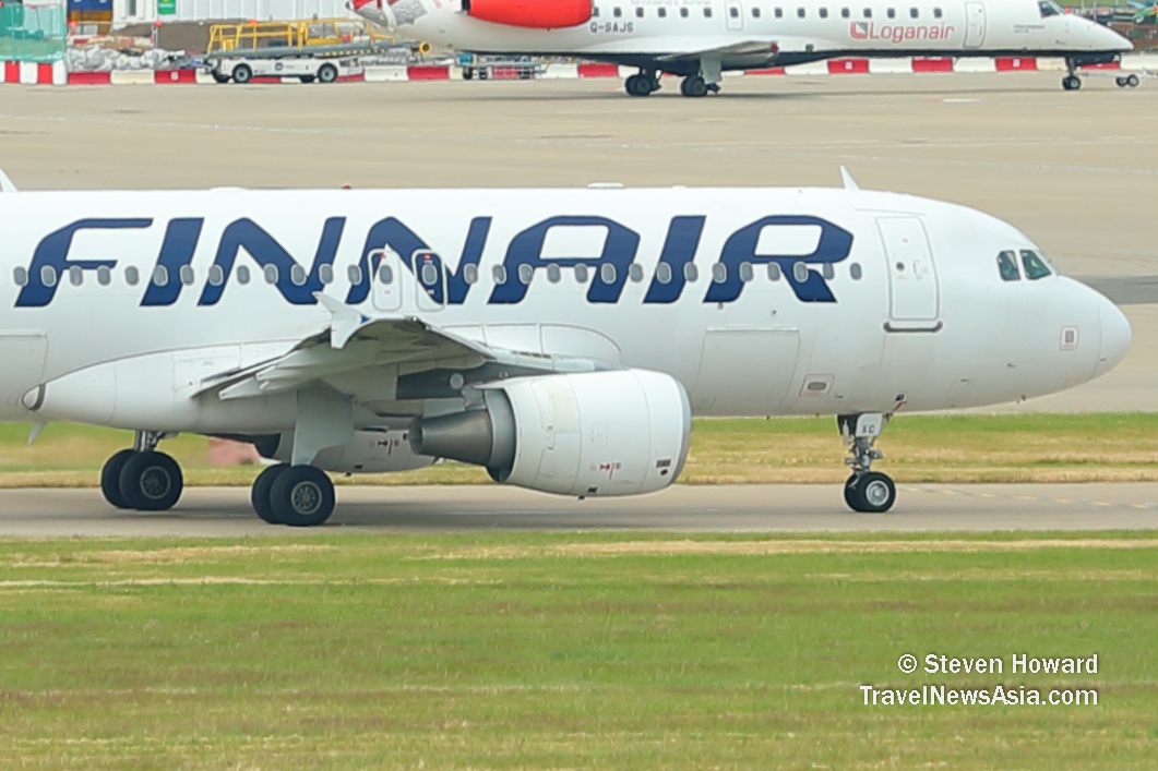 Finnair A320 reg: OH-LXC. Picture by Steven Howard of TravelNewsAsia.com Click to enlarge.
